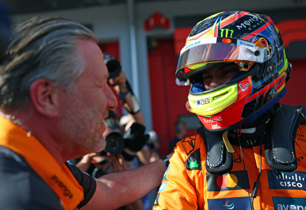 gettyimages-2215576433-1024x701-1 McLaren driver Oscar Piastri speaks to CEO Zak Brown after scoring pole for the 2025 F1 Emilia Romagna Grand Prix at Imola