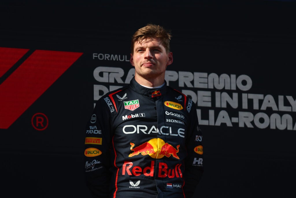 gettyimages-2215727394-1024x683-1 Red Bull driver Max Verstappen on the Imola podium after winning the 2025 F1 Emilia Romagna Grand Prix