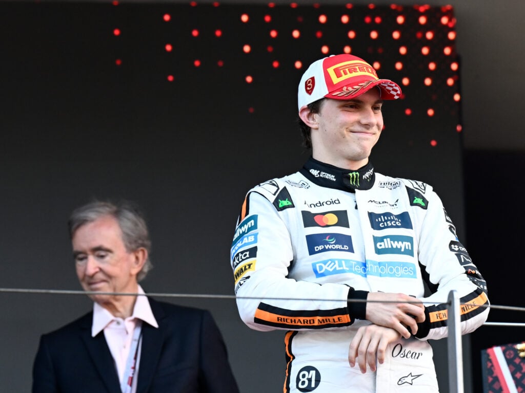 gettyimages-2216340781-1024x768-1 McLaren driver Oscar Piastri standing on the podium at the 2025 Monaco Grand Prix