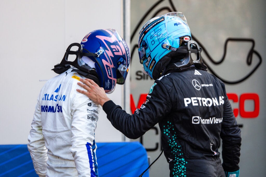 gettyimages-2216980274-1024x683-1 Mercedes driver George Russell putting his hand on Williams driver Alex Albon's shoulder after the 2025 Monaco Grand Prix
