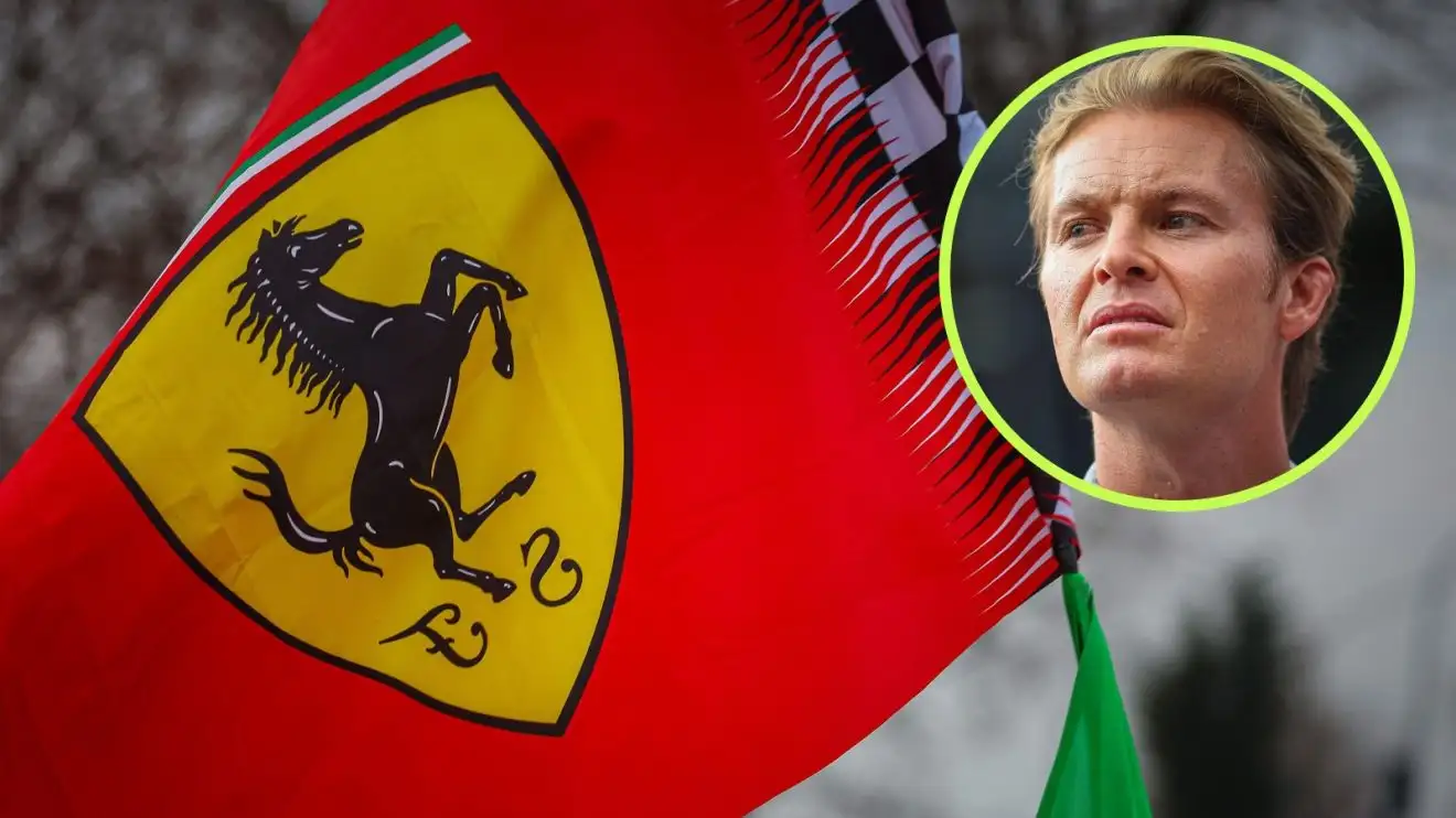 c-1012 The Ferrari flag waving, as Nico Rosberg looks that way from a circle top right
