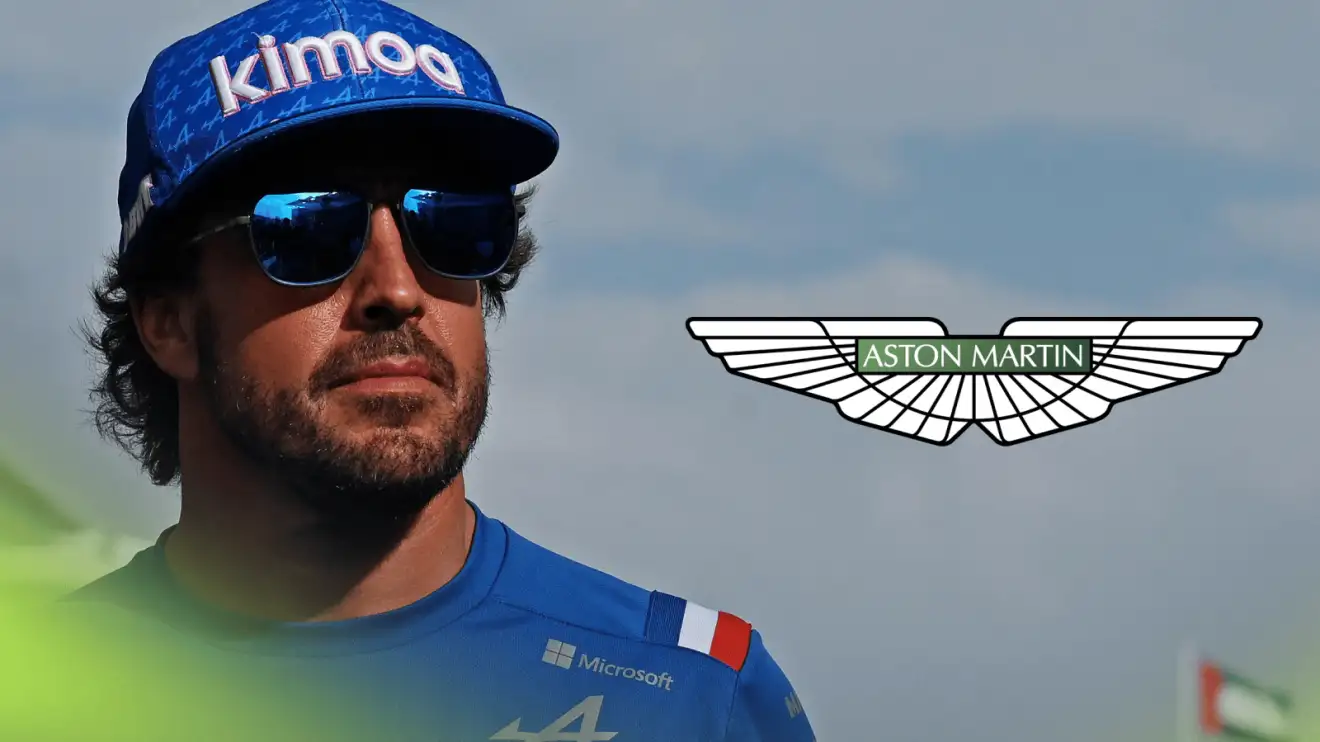 c-1021 Fernando Alonso wearing Alpine team kit with a prominent Aston Martin logo alongside him