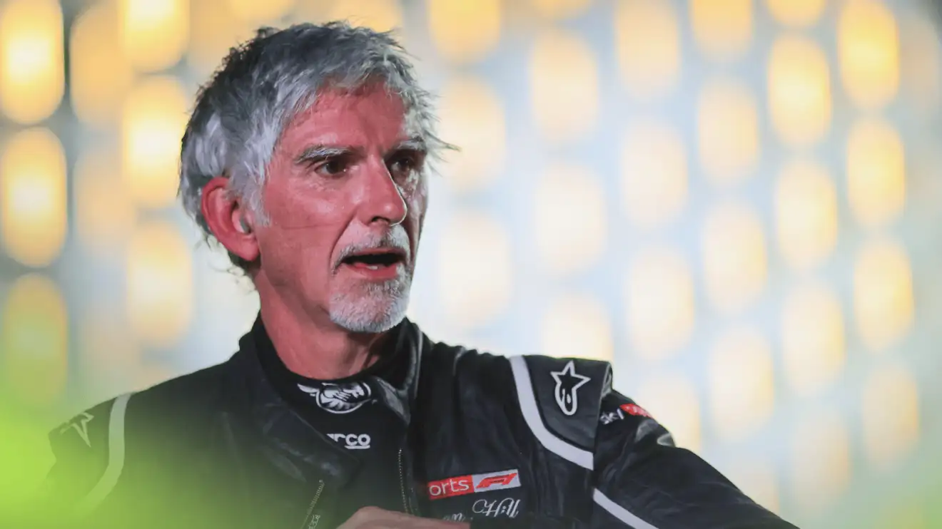 c-1081 Damon Hill looks exhausted after driving an F1 car in Jeddah while wearing Sky F1 overalls