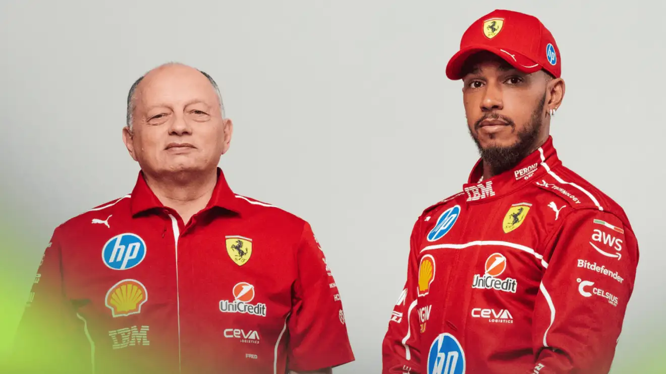 c-1090 Fred Vasseur and Lewis Hamilton stand together for a Ferrari promotional shot