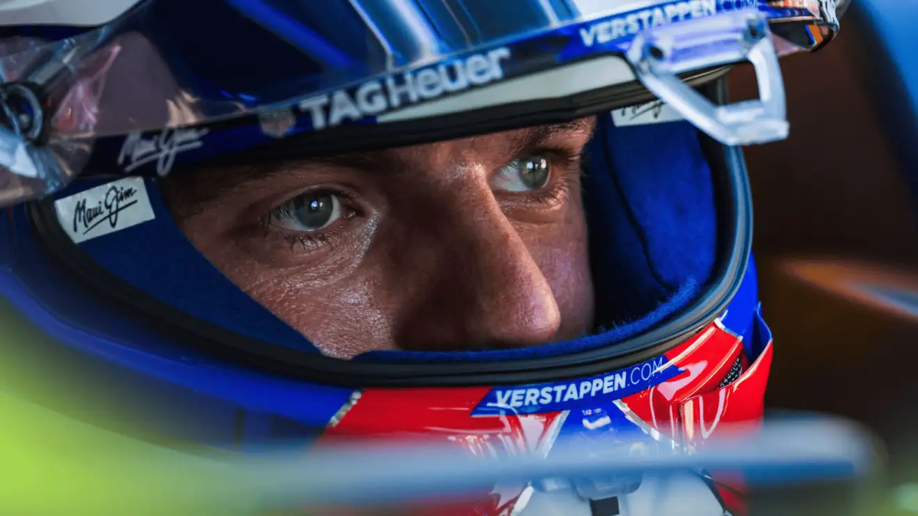 c-135 A close-up shot of Max Verstappen with the visor of his helmet open