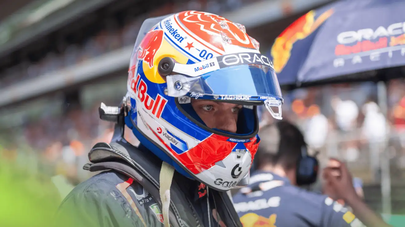 c-219 Max Verstappen wearing his helmet with the visor open on the grid in Spain