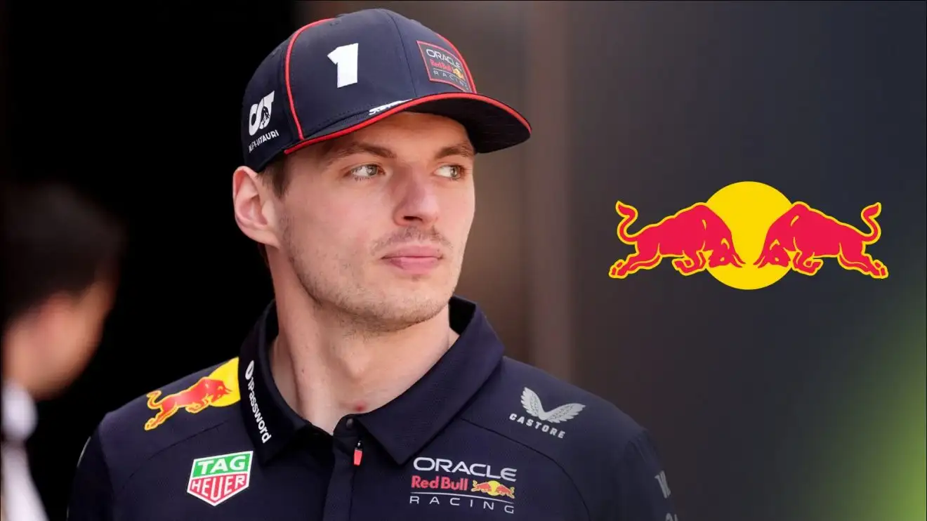c-287 Red Bull's Max Verstappen looking right of screen with a Red Bull logo to his right