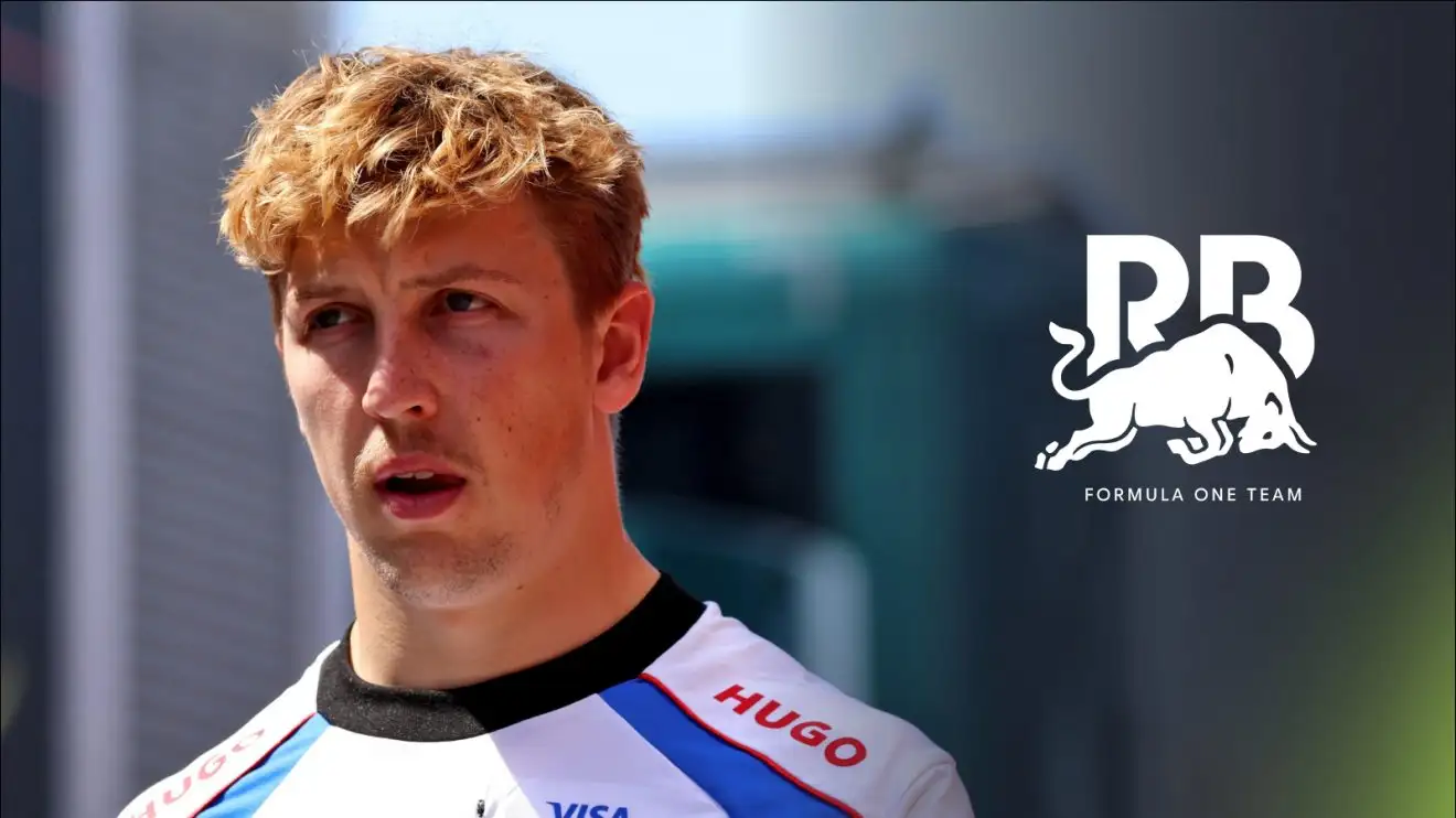 c-356 Racing Bulls driver Liam Lawson walking through the F1 paddock.