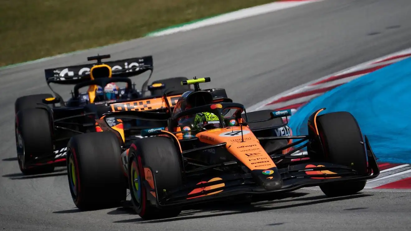 c-363 Lando Norris in his McLaren narrowly heads Max Verstappen during the Spanish Grand Prix.