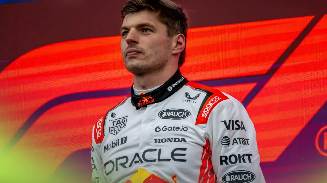 c-369 Max Verstappen stands on the podium victorious at the 2025 Japanese Grand Prix