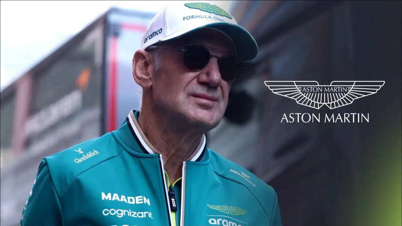 c-453 Adrian Newey pictured at the 2025 Monaco Grand Prix, with an Aston Martin badge on his right