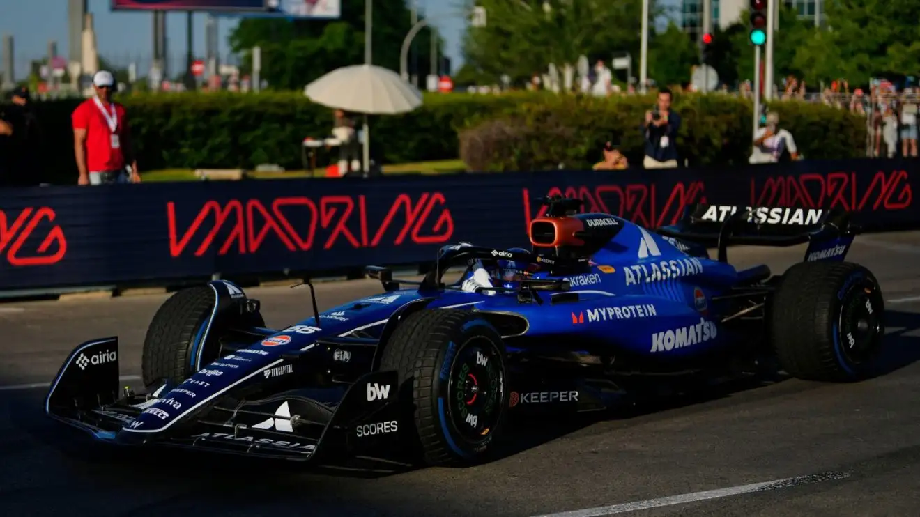 c-513 Carlos Sainz of Spain steers his car during a demonstration on a section of the future Formula 1 street circuit in Madrid.