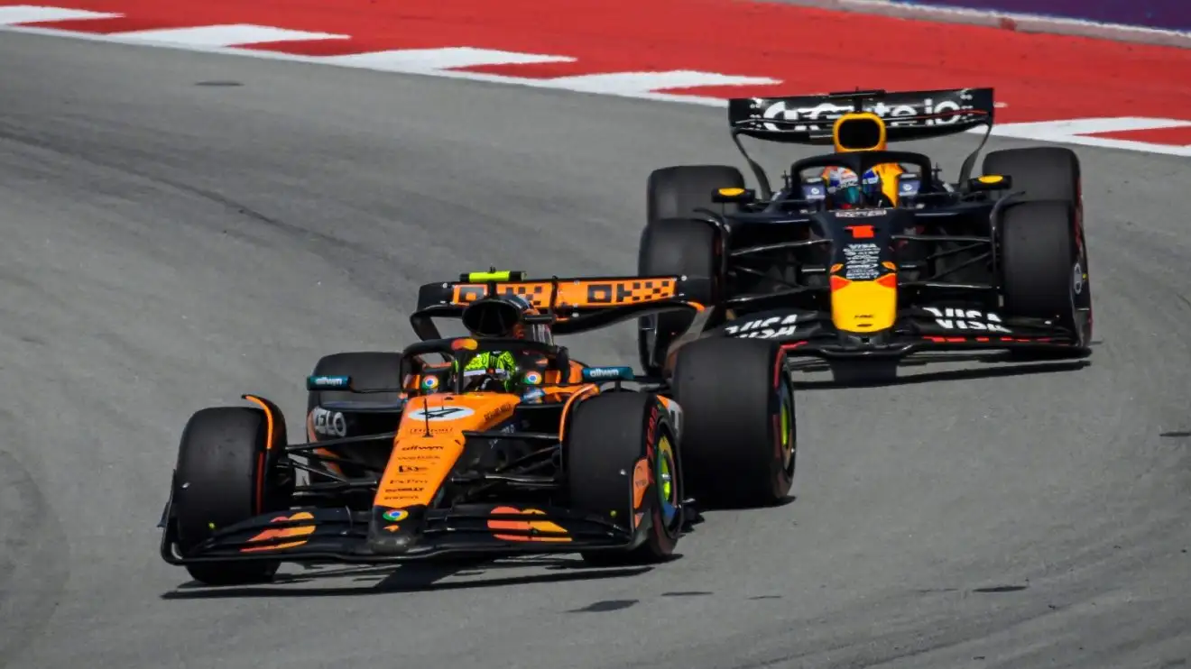 c-537 Max Verstappen pursues Lando Norris during the Spanish Grand Prix.