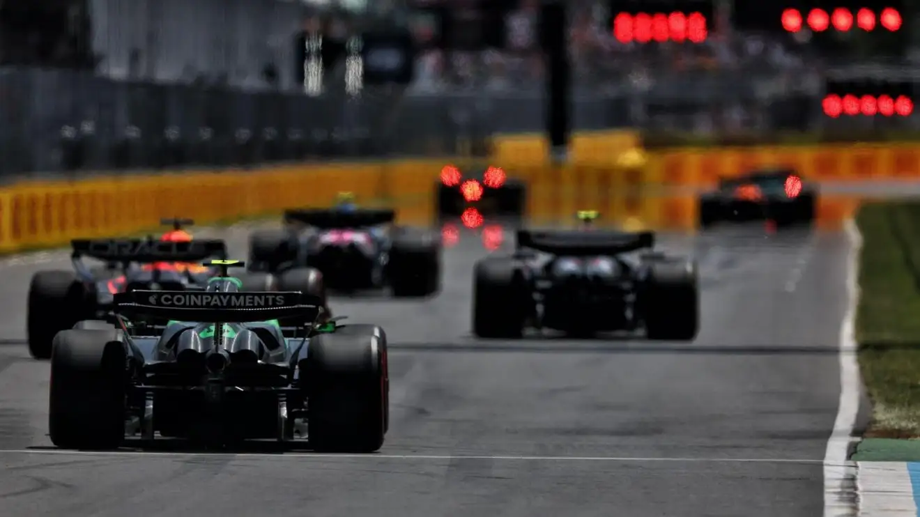 c-775 Cars approach the grid to perform a practice start at the Canadian Grand Prix.