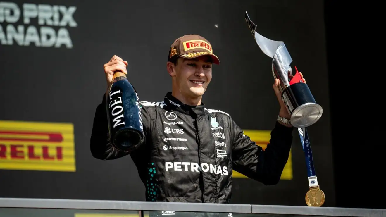 c-865 George Russell on the podium after winning the Canadian Grand Prix.