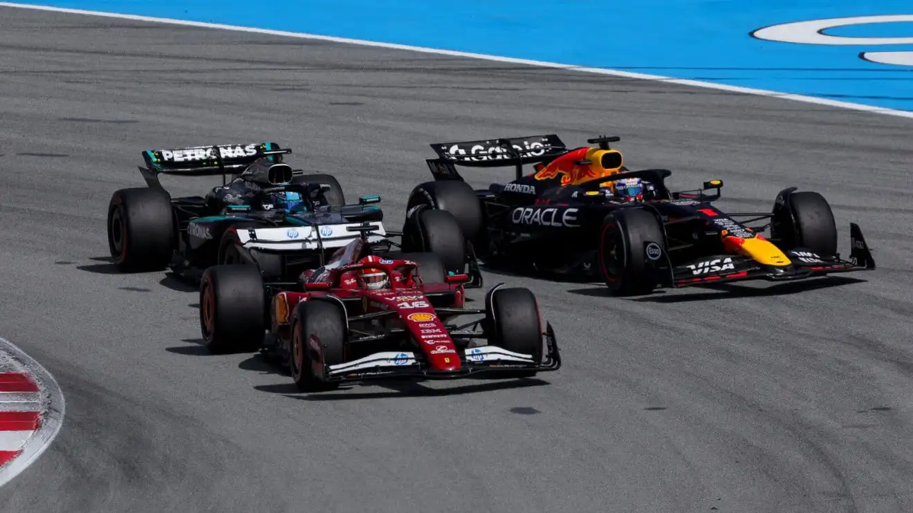 c-87 Charles Leclerc racing Max Verstappen and George Russell