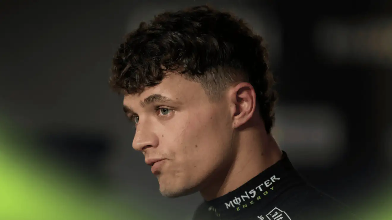 c-874 Lando Norris looks uncomfortable as he faces the media