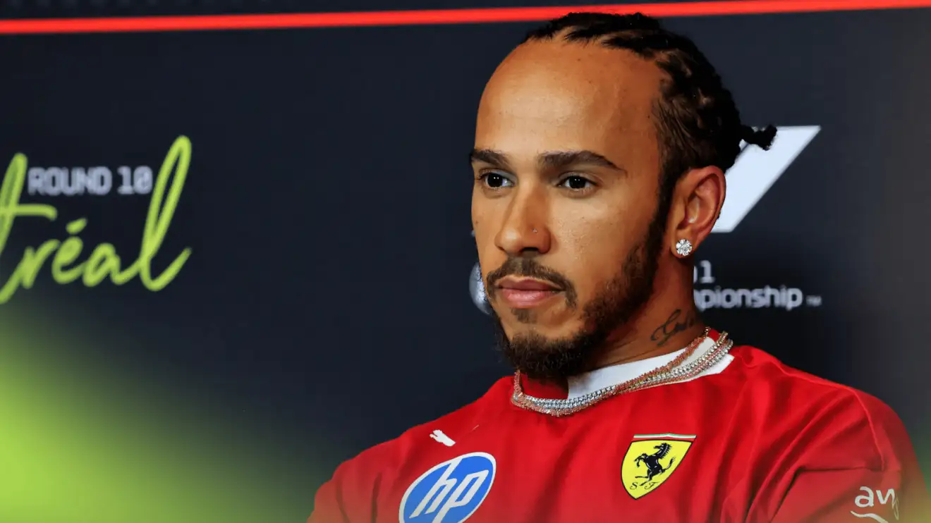 c-907 Lewis Hamilton looks on in a press conference in Canada