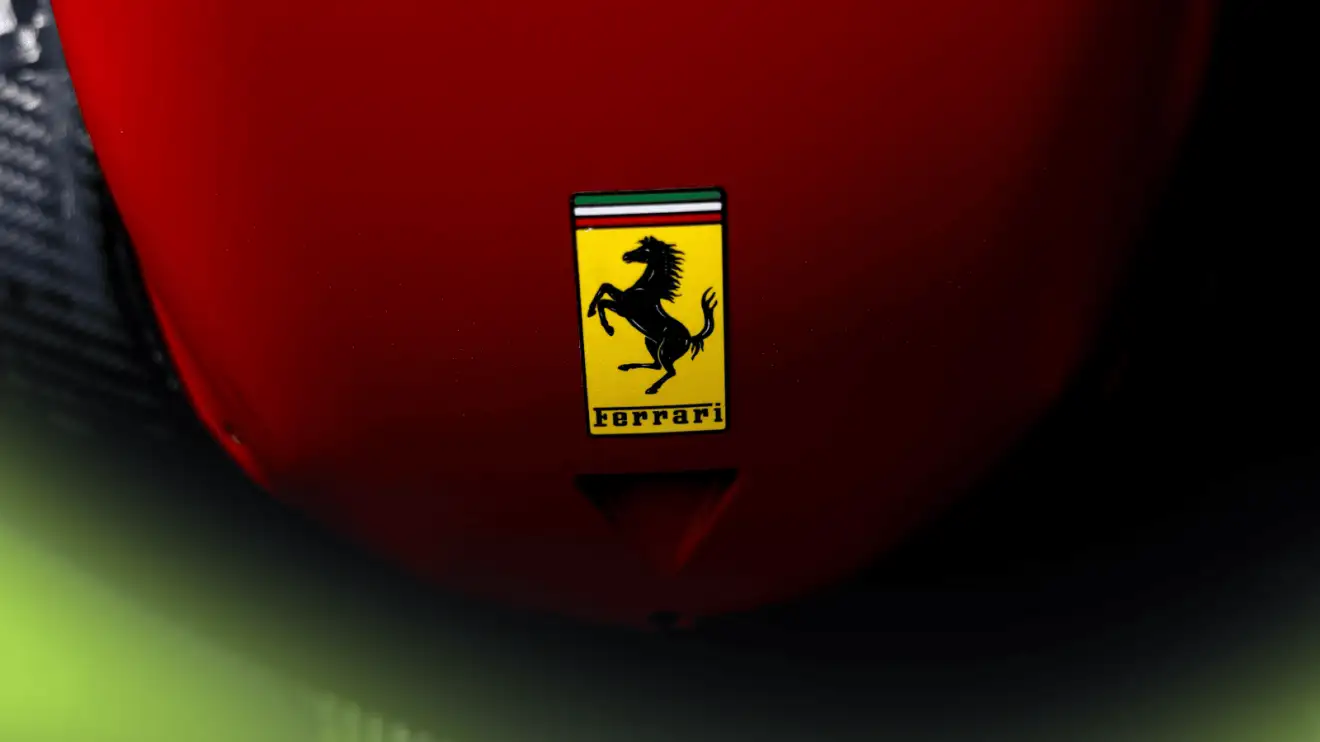 c-982 A close-up shot of the Ferrari logo on the nose of the SF-25 car