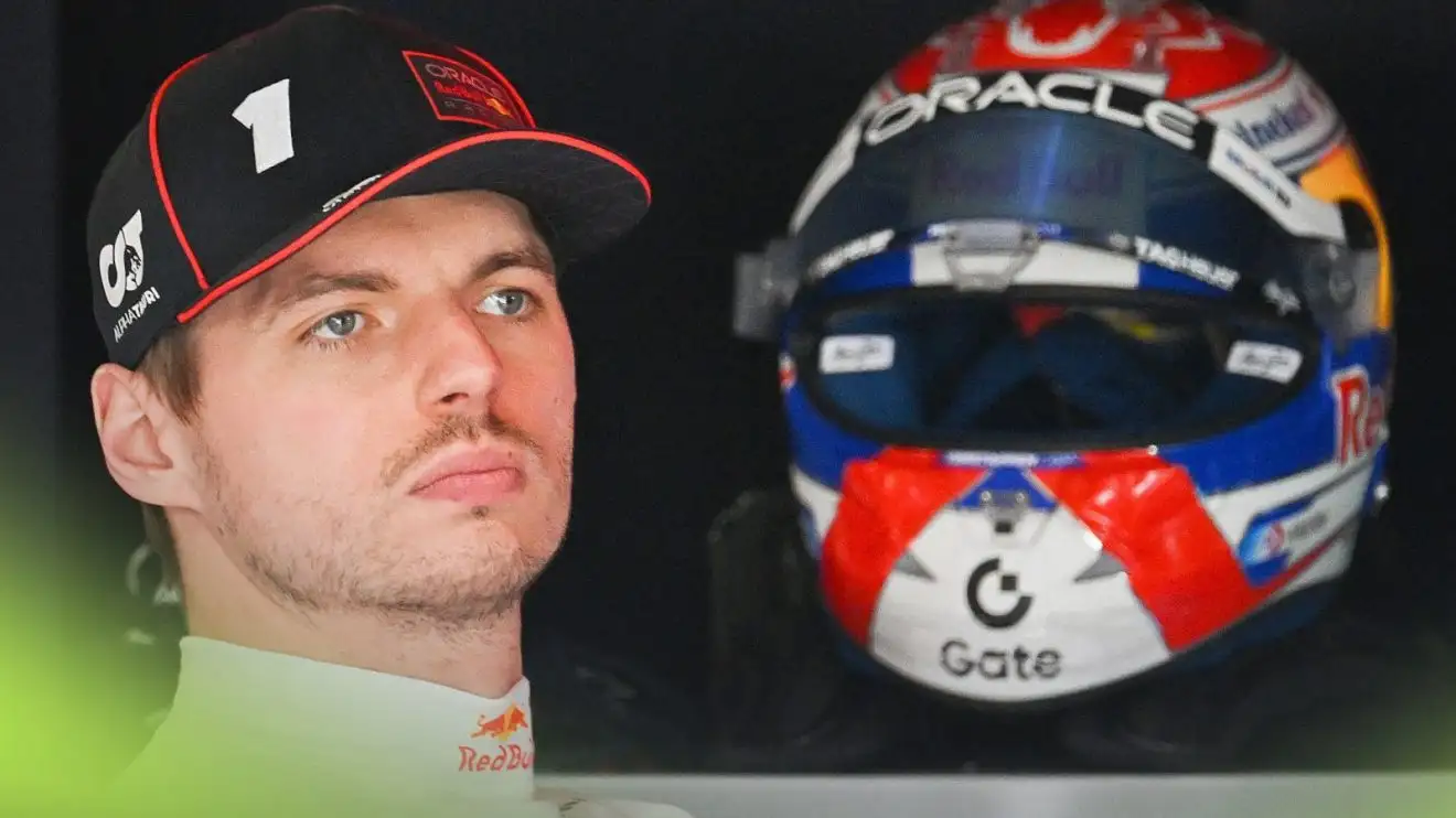 c-994 Max Verstappen pictured in the Red Bull garage at the 2025 Canadian Grand Prix, with his helmet visible in the background