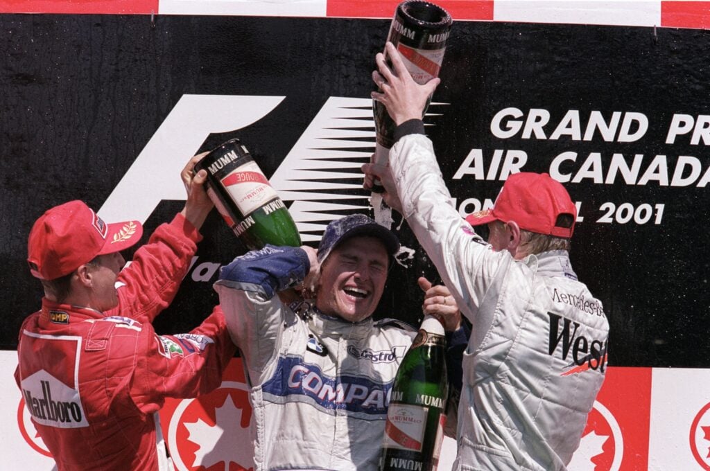 gettyimages-1193801-1024x680-1 Michael Schumacher and Mika Hakkinen celebrate Ralf Schumacher winning the 2001 F1 Canadian Grand Prix