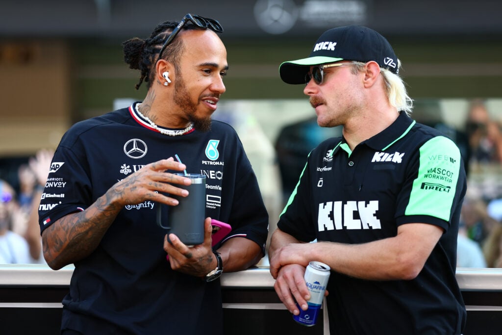 gettyimages-2188844610-1024x683-1 Lewis Hamilton discusses with former teammate Valtteri Bottas at Abu Dhabi GP 2024.