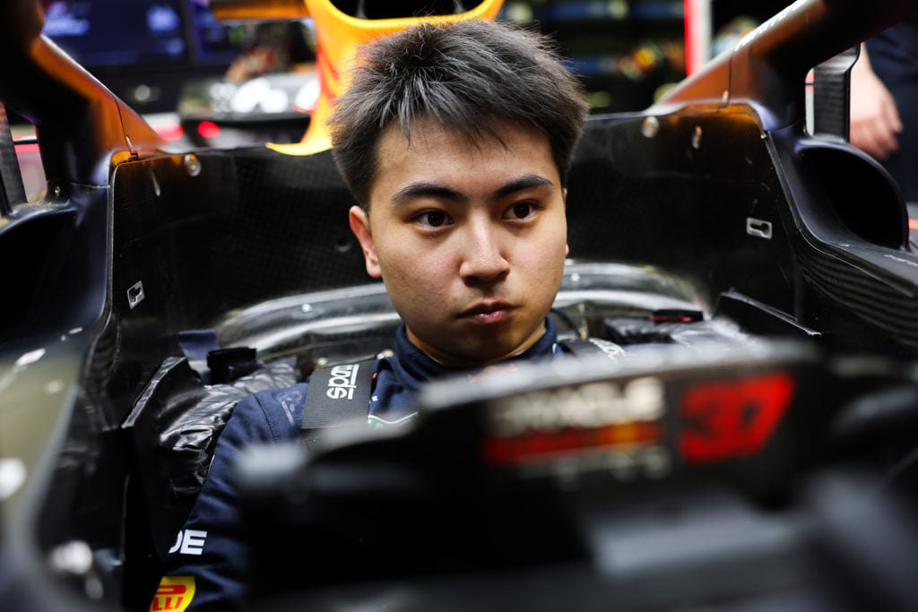 gettyimages-2209589248-1024x683-1 Red Bull reserve driver Ayumu Iwasa gets prepared in Max Verstappen's seat for FP1 for the 2025 F1 Bahrain Grand Prix