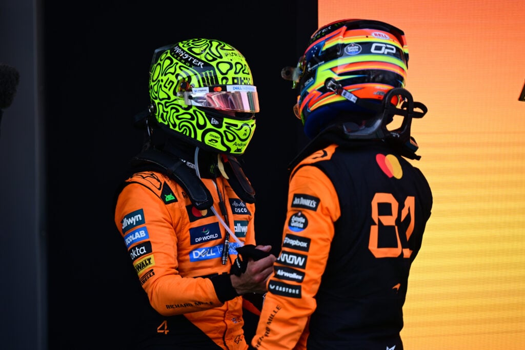 gettyimages-2217525988-1024x683-1 McLaren drivers Oscar Piastri and Lando Norris shaking hands after the 2025 Spanish Grand Prix