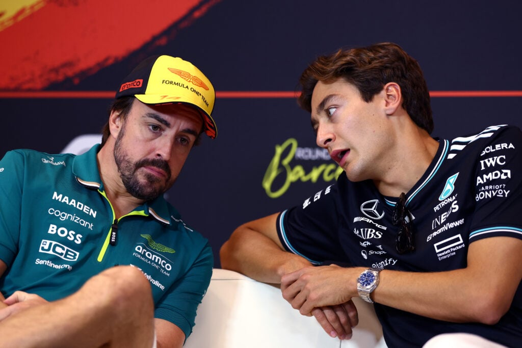 gettyimages-2217651753-1024x683-1 Mercedes driver George Russell speaking to Aston Martin driver Fernando Alonso at the Spanish Grand Prix