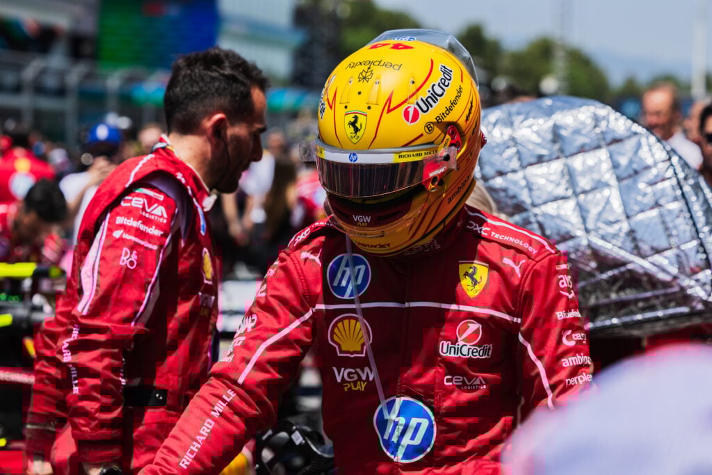 Ferrari driver Lewis Hamilton walking down the grid at the 2025 Spanish Grand Prix