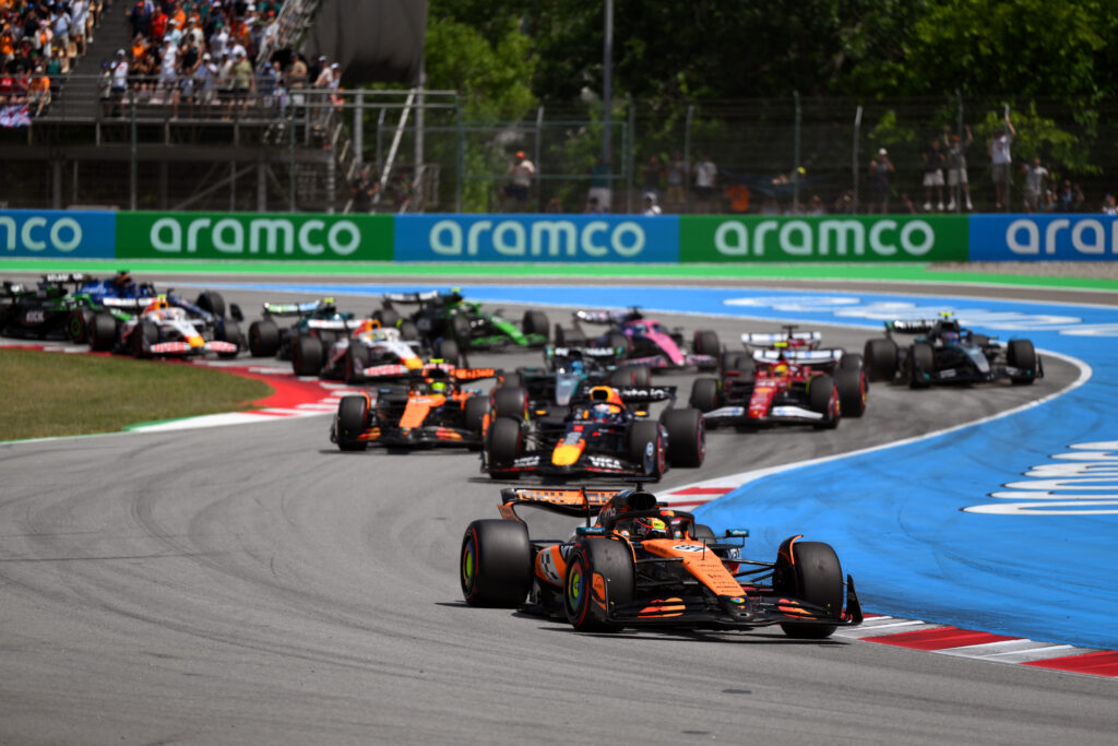 gettyimages-2218090193-1024x683-1 Red Bull driver Max Verstappen follows Oscar Piastri of McLaren at the start of the 2025 F1 Spanish Grand Prix