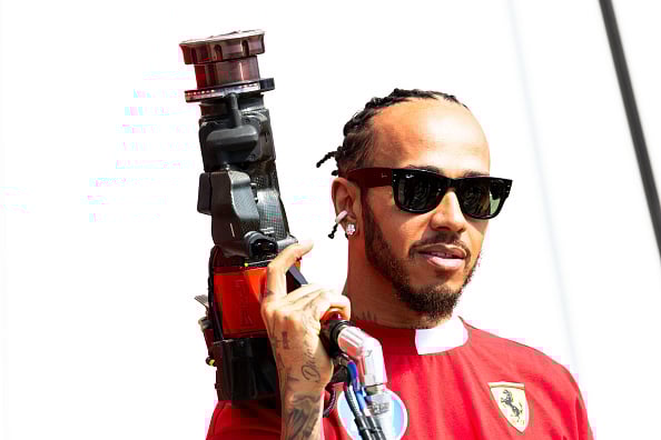 gettyimages-2219958545 Ferrari driver Lewis Hamilton holds a wheel gun at the 2025 F1 Canadian Grand Prix