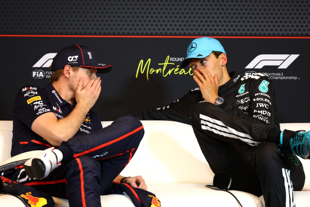 gettyimages-2220307482-1024x683-1 Red Bull driver Max Verstappen speaks to George Russell of Mercedes after the 2025 F1 Canadian Grand Prix