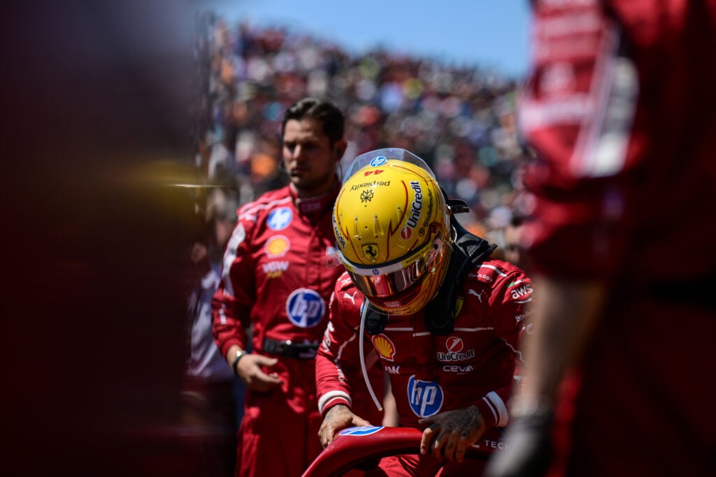 gettyimages-2220309427-1024x683-1 Lewis Hamilton climbs into his Ferrari F1 car