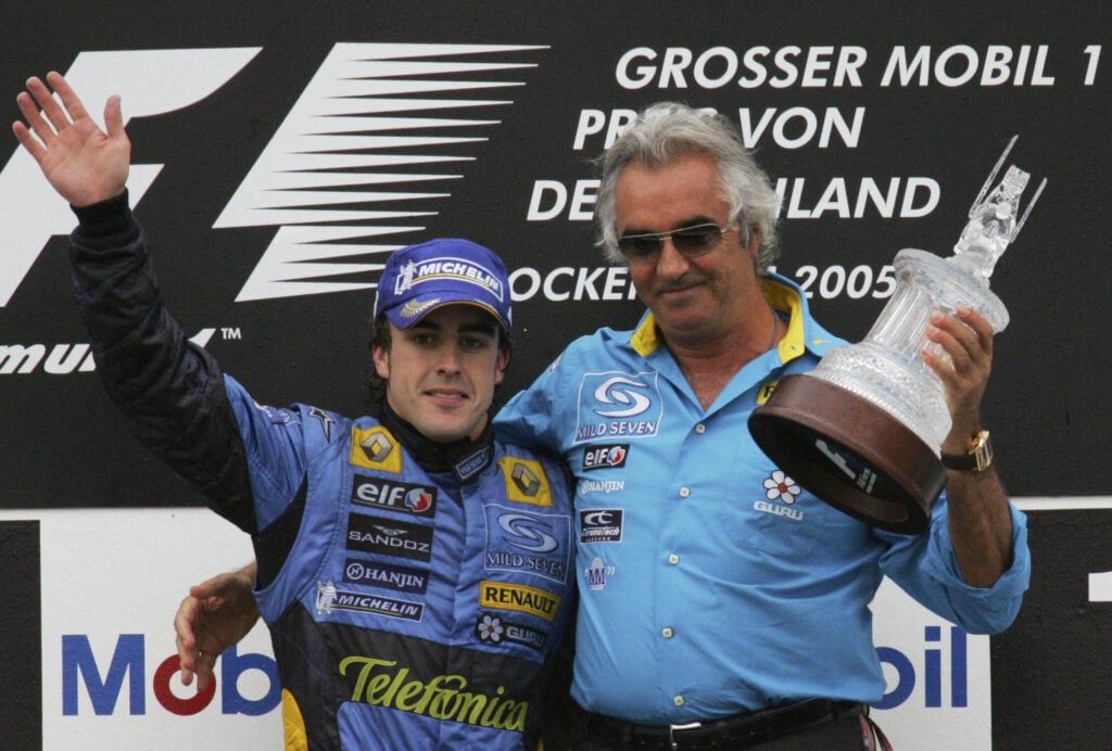 gettyimages-53280014-1024x692-1 Renault driver Fernando Alonso and team principal Flavio Briatore on the podium at the German Grand Prix